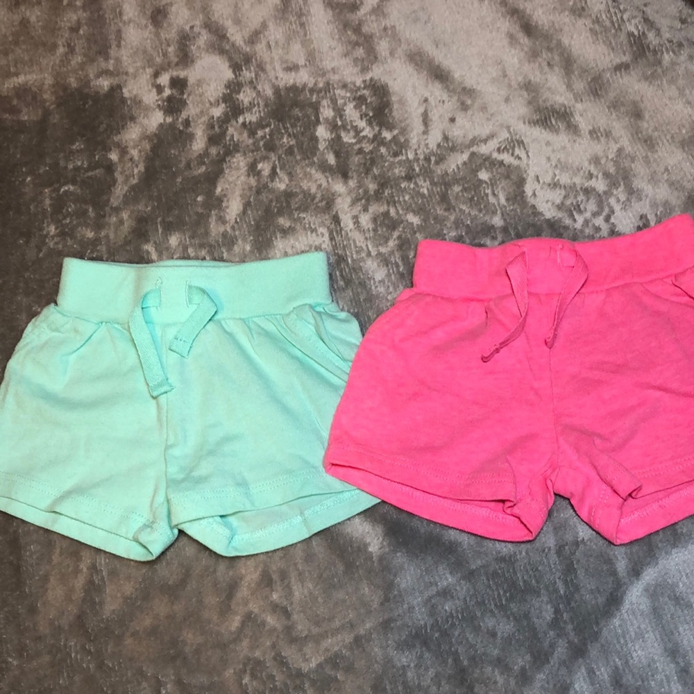 NB shorts. Mint green. Pink. Like new. Barely worn.
